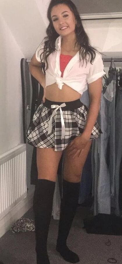 Dressed as a schoolgirl