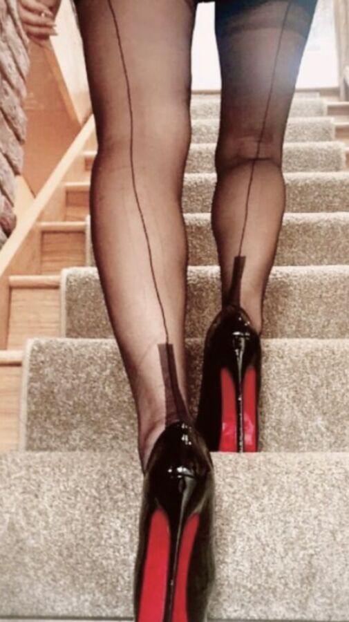 Wearing my new stockings and heels for the Captain