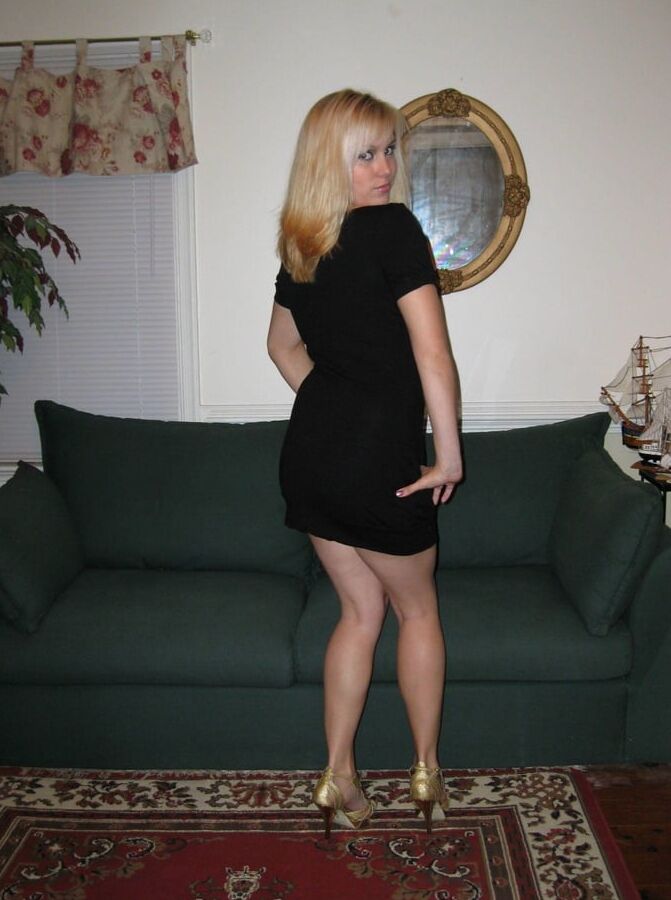 Blonde Showing Off In Her Little Black Dress
