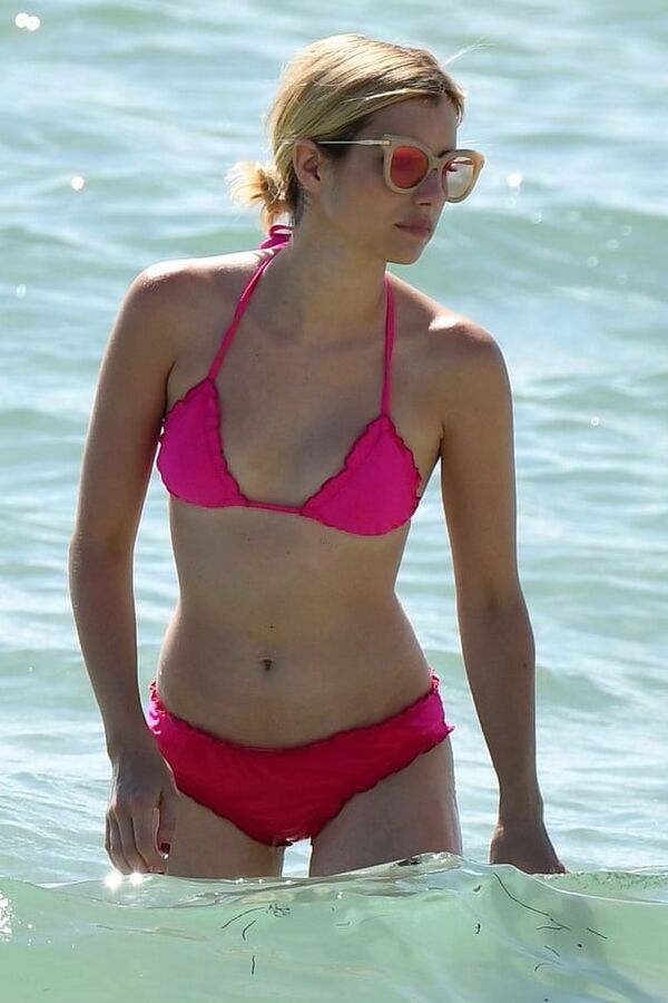 Emma Roberts in pink bikini swim suit