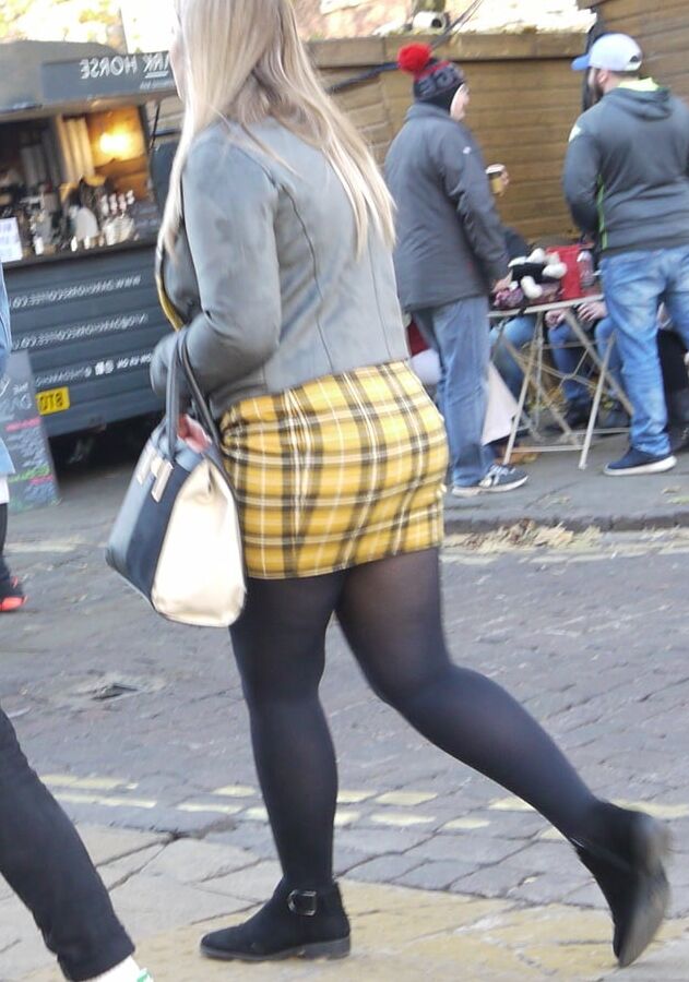 cute blonde in yeloow skirt and black pantyhose