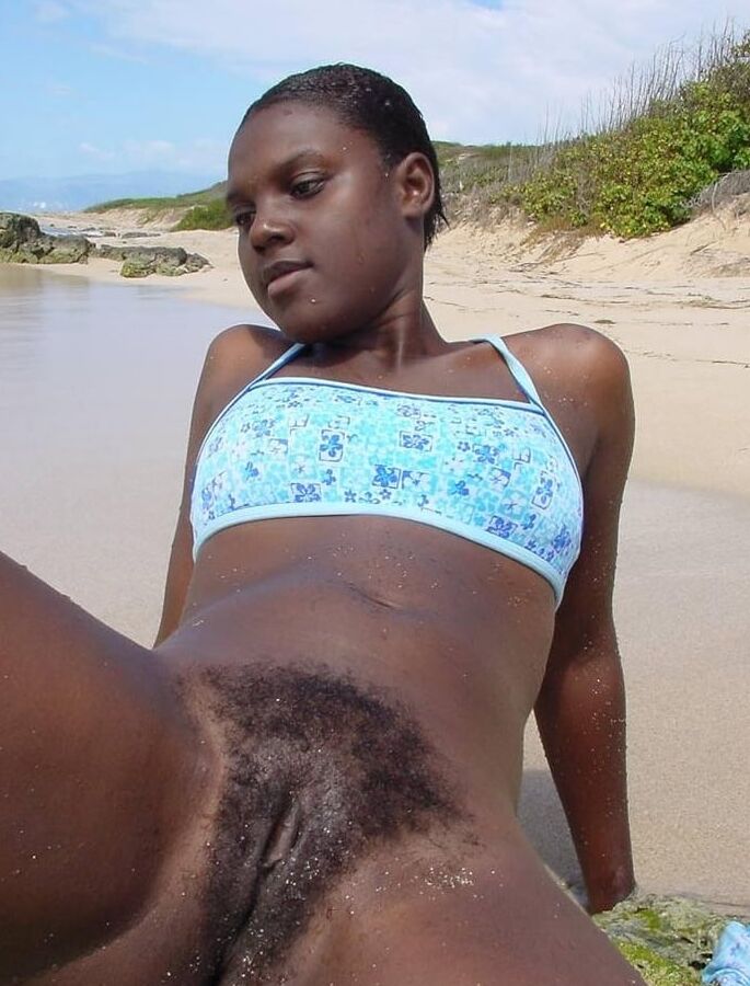 beautiful black young girl on beach