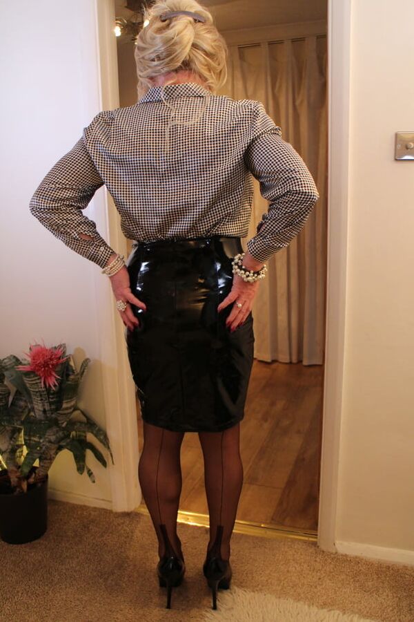 Gallery Sindy in dogtooth blouse and pvc skirt