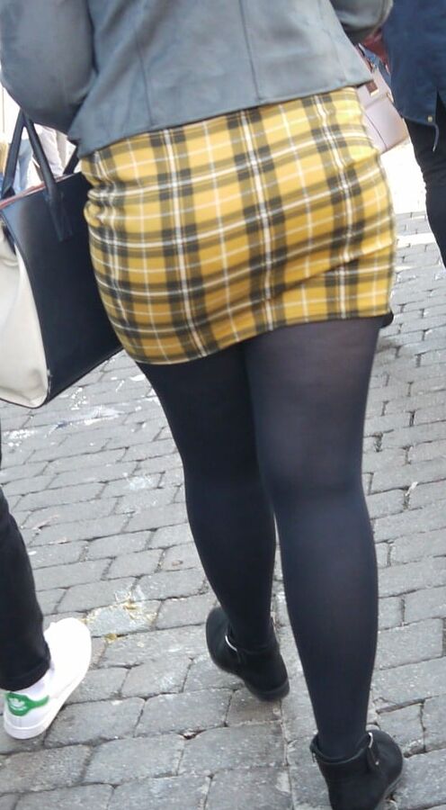 cute blonde in yeloow skirt and black pantyhose