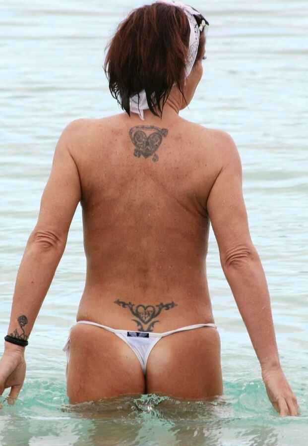 Daniella Westbrook topless Tenerife beach jan