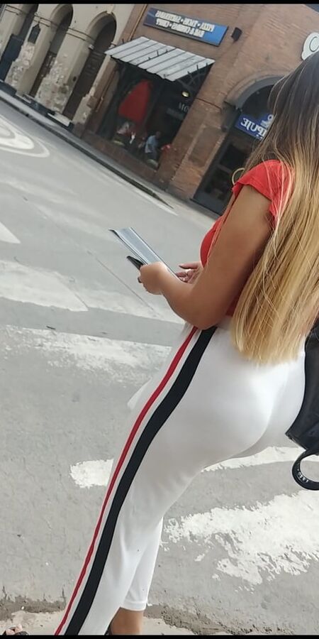 Blonde with checkered thong in white yoga pants