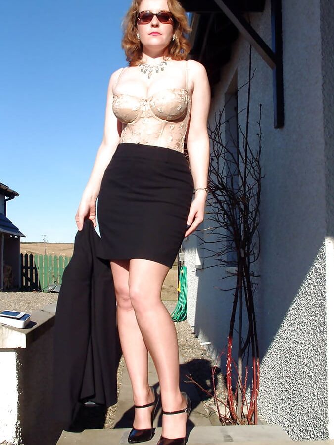 Lady Stephanie In Black Wearing Tan FF Stockings