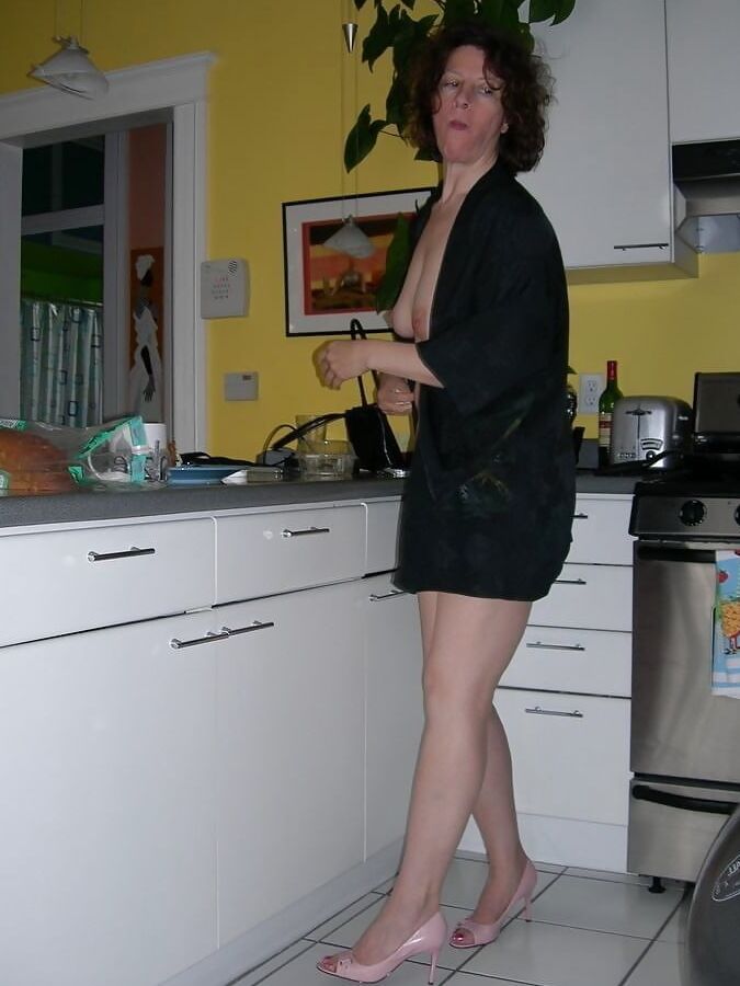 Sexy Angelina in the kitchen.