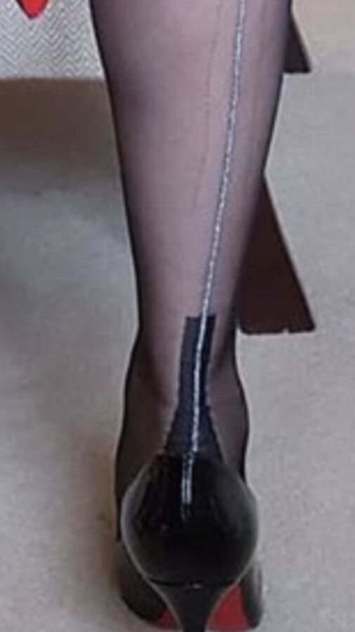 My new silver seamed stockings and black leather skirt