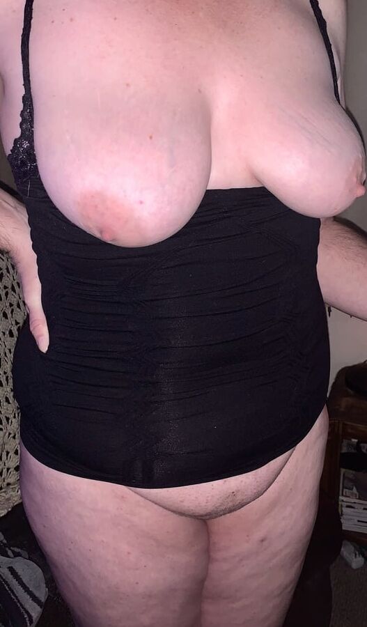 Her tits in and out of black lace tank top.