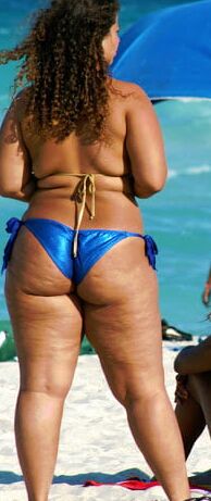 Hot sexy milf ass in bikini at beach