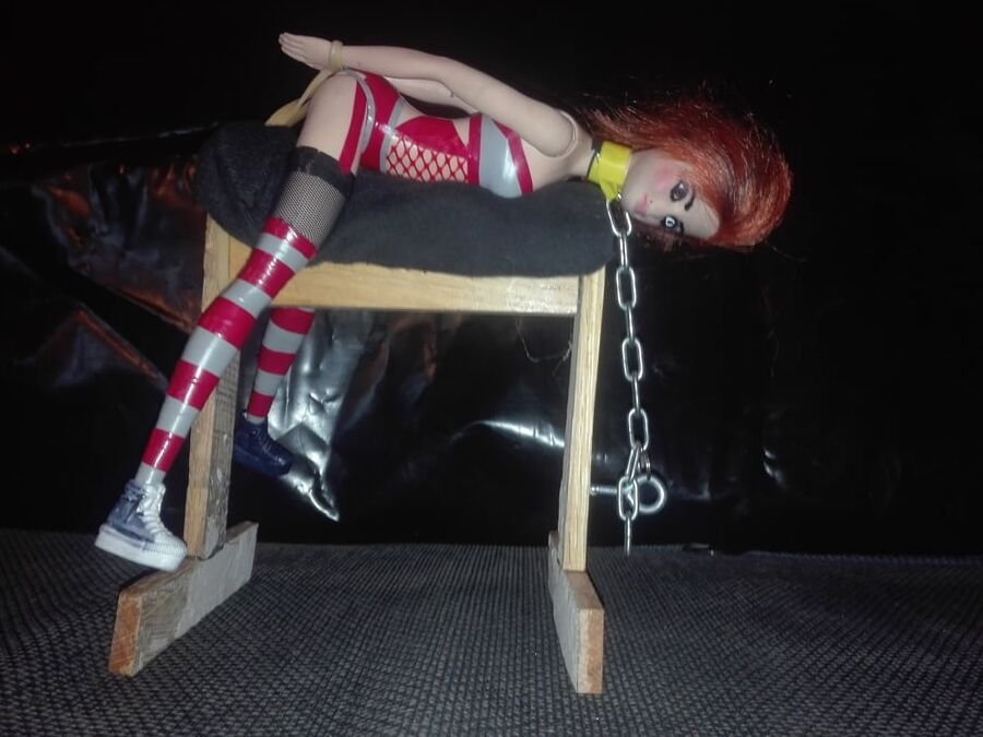 Barbie Doll bondage hard on BDSM pillory