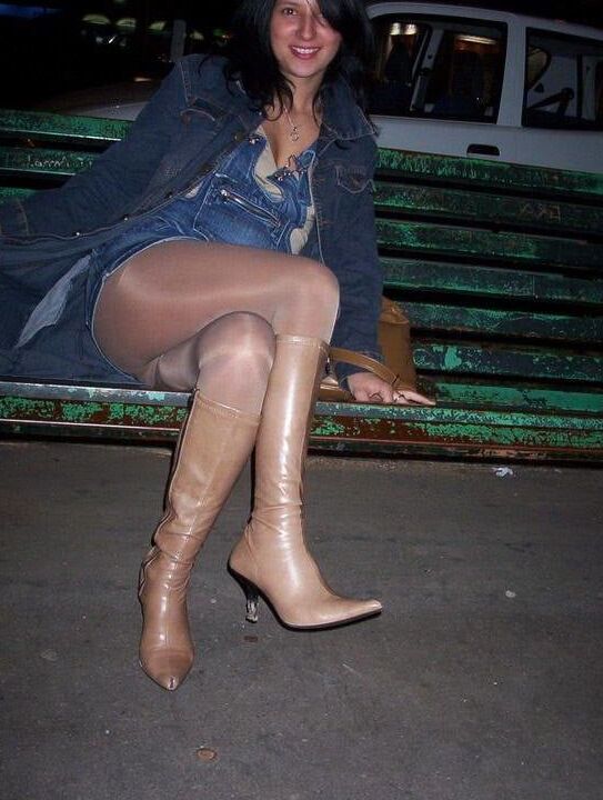 European Nina wearing tan tights and boots