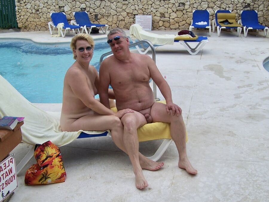Hot Mature Swinger Couple play in the Pool