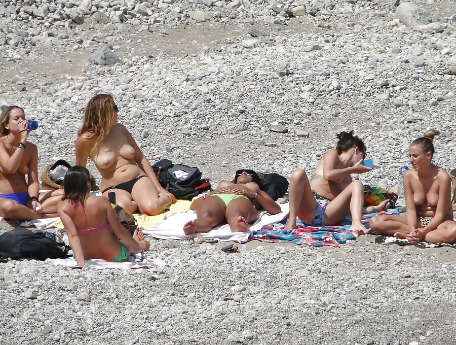 Girls Changing on the Beach for Topless Lovers