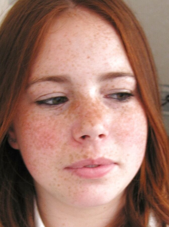 Freckled redhead sucks cock