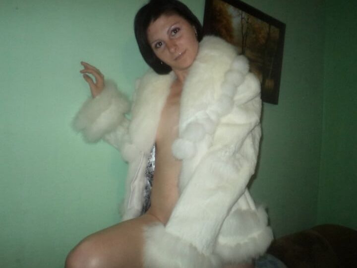 Nude under fur coat