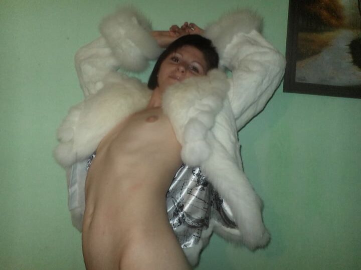 Nude under fur coat