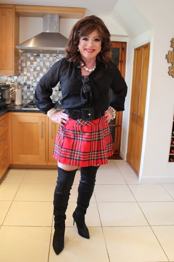 Black satin blouse and red mini kilt with OTK boots