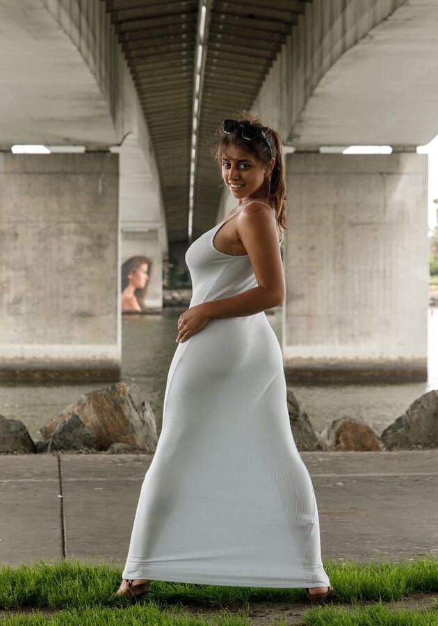 Exotic Girl Posing In Her White Dress
