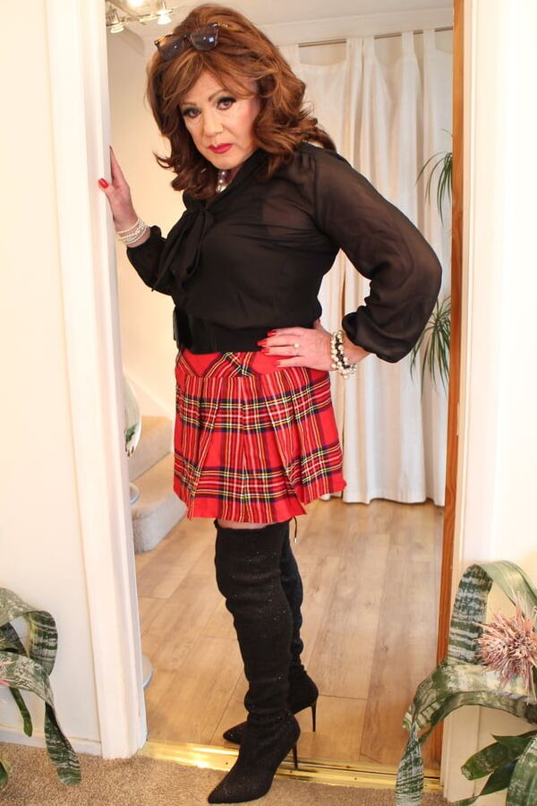 Black satin blouse and red mini kilt with OTK boots