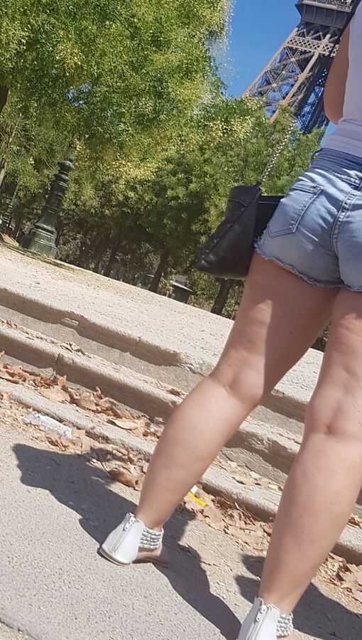 pretty ass brunette in mini shorts
