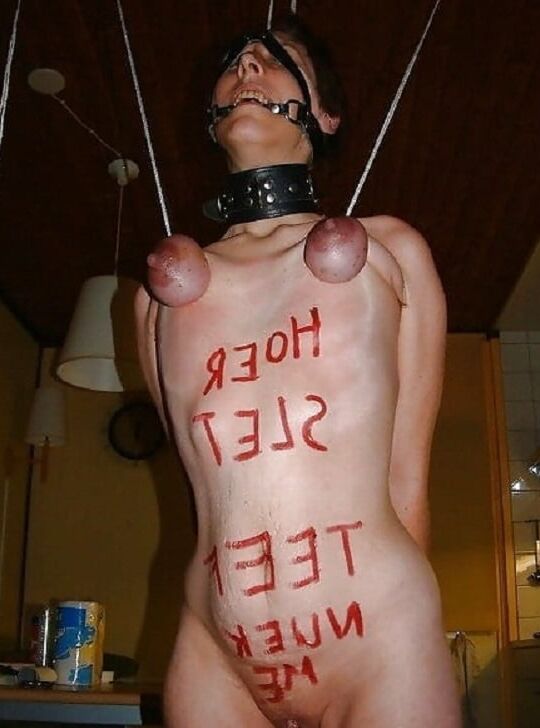 Girl in heavy tits bondage
