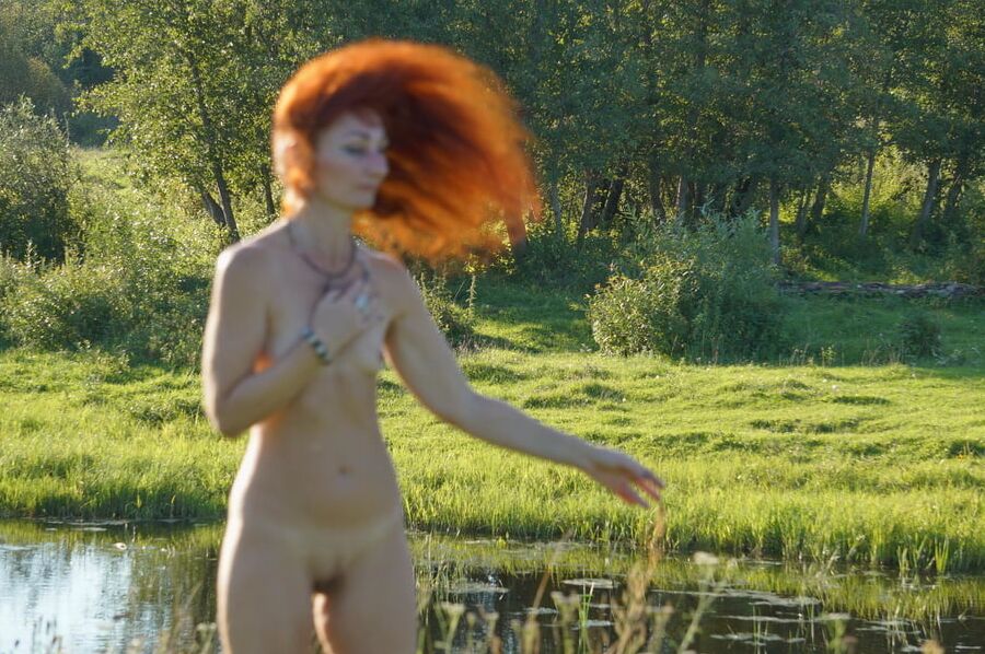 Flame Hair naked upon river
