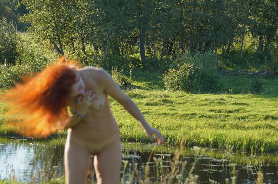 Flame Hair naked upon river