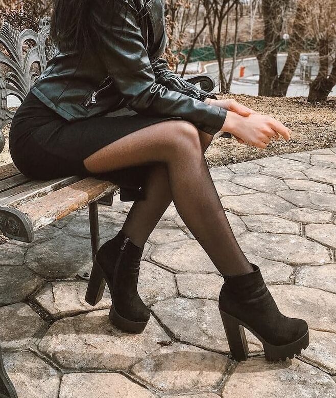 Legs, boots and pantyhose of sexy friend