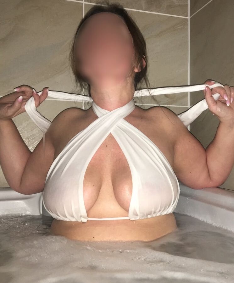 Wife see through and naked in hot tub