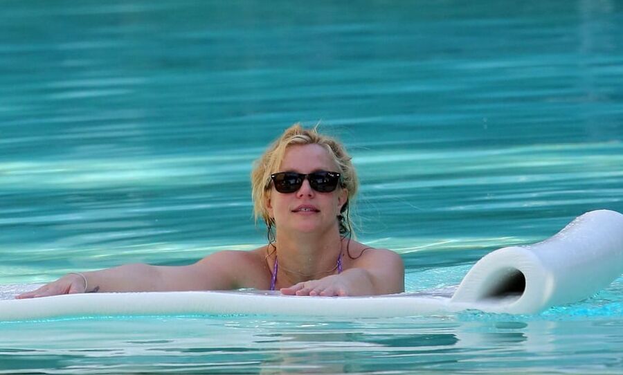 Britney Spears in a Bikini at a Pool in Miami ..