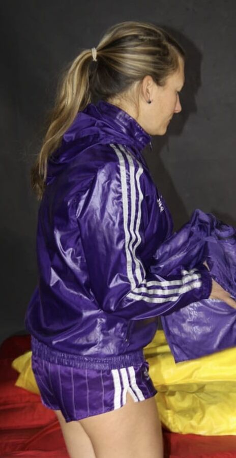 Girls in Adidas shine jackets and shorts