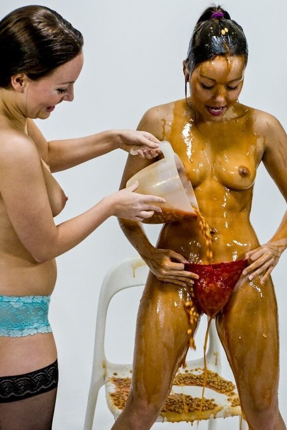 Messy girls covered in goo
