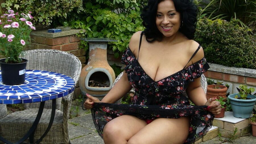 Donna Ambrose Wearing Printed Dress On The Patio Non Nude