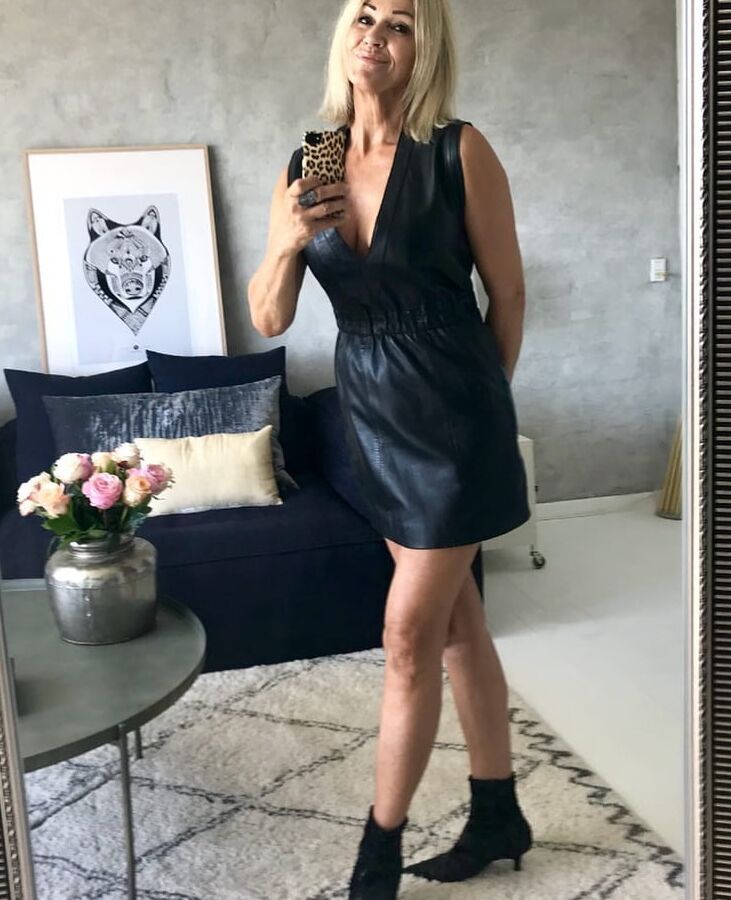 Hot Danish mature mom in leather skirts