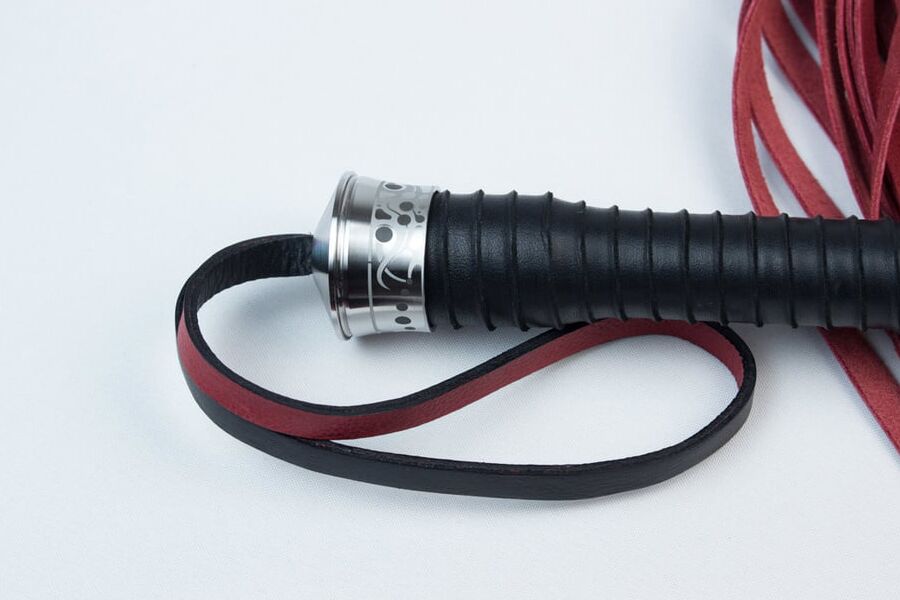 Red leather flogger