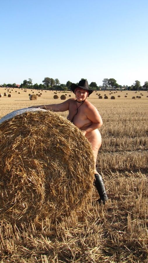 Completely naked in a corn field ...