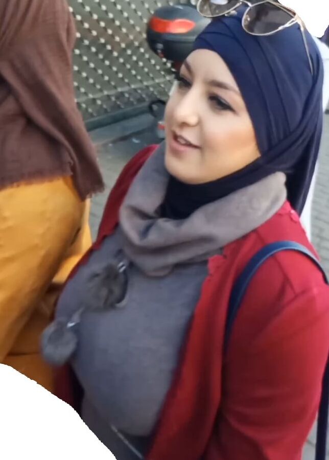tow arabian hijab girls with huge boobs spy in street