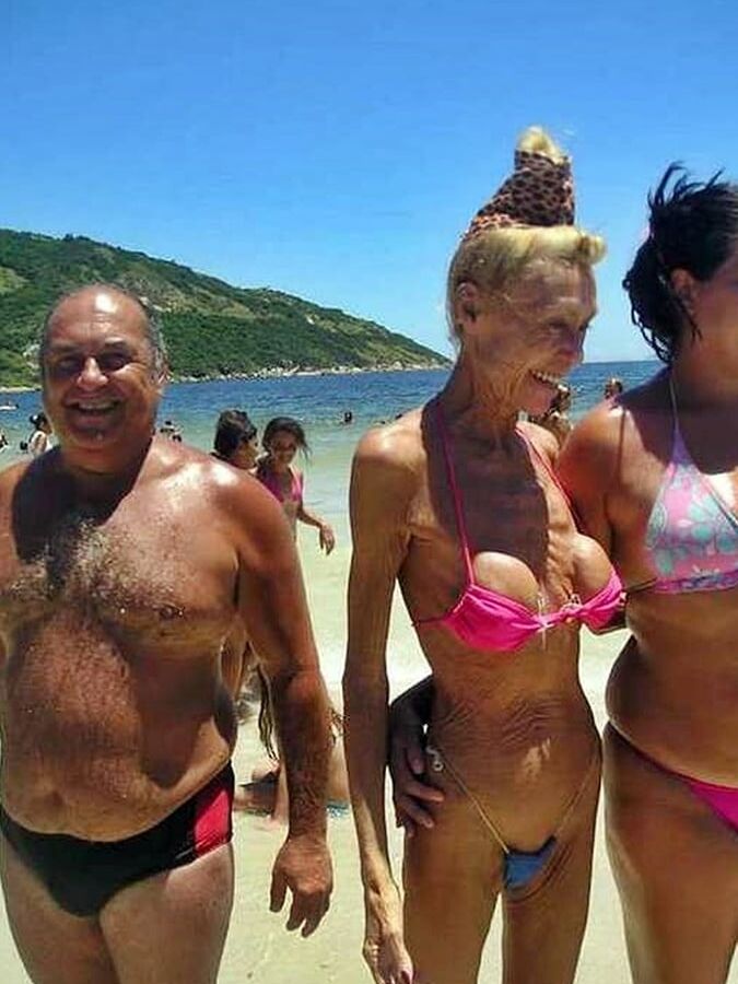 Skinny Granny On The Beach