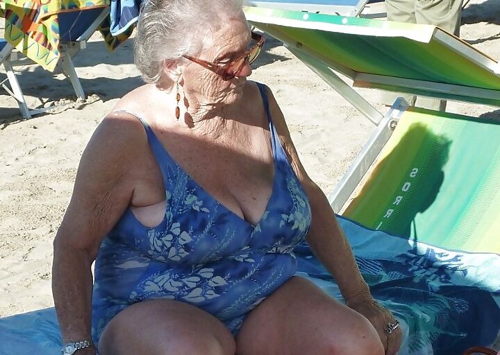 Skinny Granny On The Beach