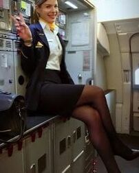 Sexy Stewardess in Heels and stockings
