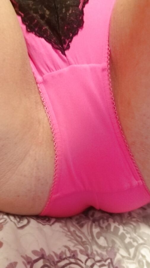 Plugged for the night. Hot pink and black panties &amp; bra milf