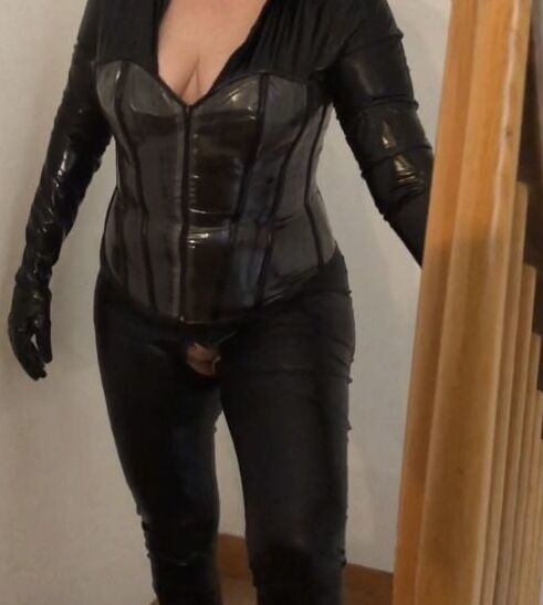 Catsuit, Boots, Corset and Pissing