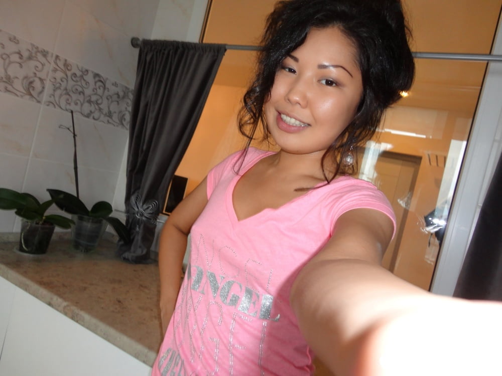Naughty Asian teasing all around her apartment