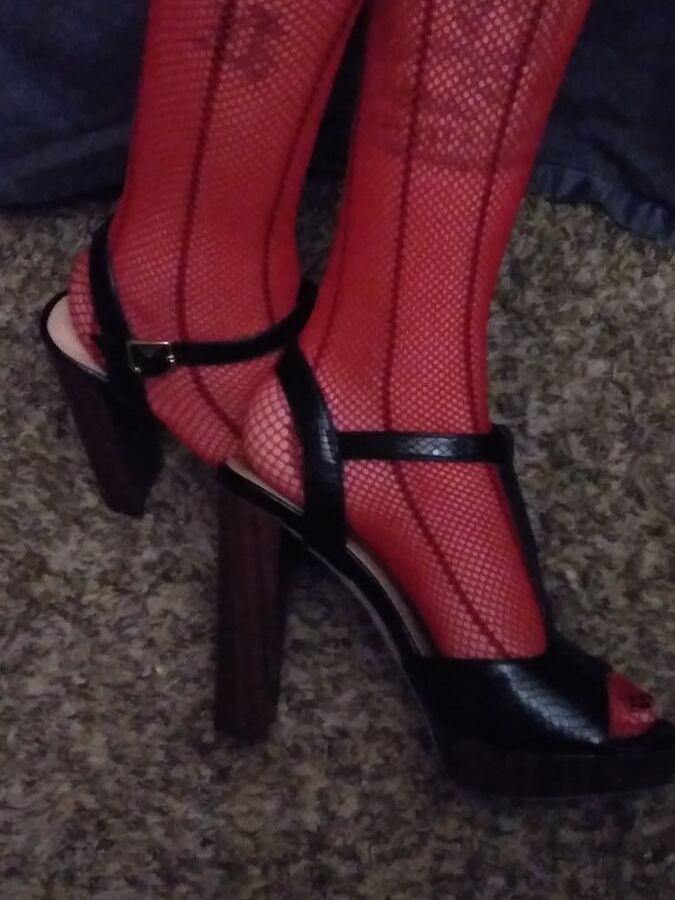 red fishnets and black heels