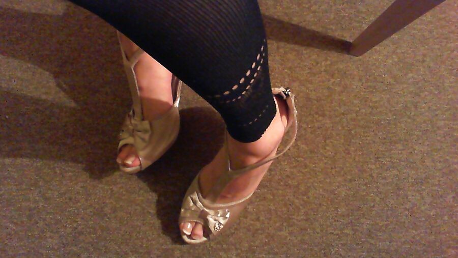 Feet in Pantyhose and Flats