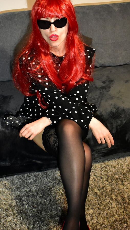 Redhead wife with black stockings and red high heels