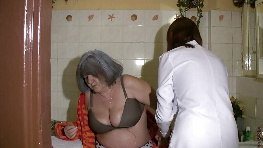 Young nurse washes a granny for fucking