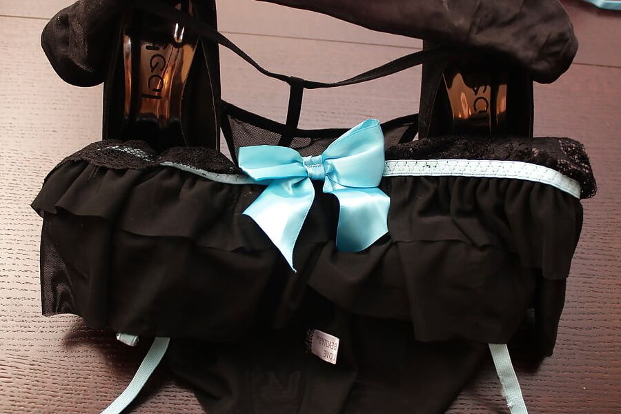 All black:heels, panties, suspenders, stockings, dress, cum
